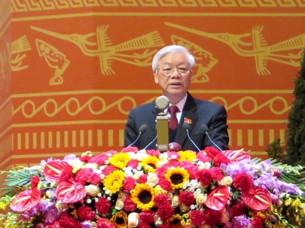 Tổng Bí thư Nguyễn Phú Trọng trình bày Báo cáo của Ban Chấp hành Trung ương Đảng khóa XI về các văn kiện Đại hội XII của Đảng